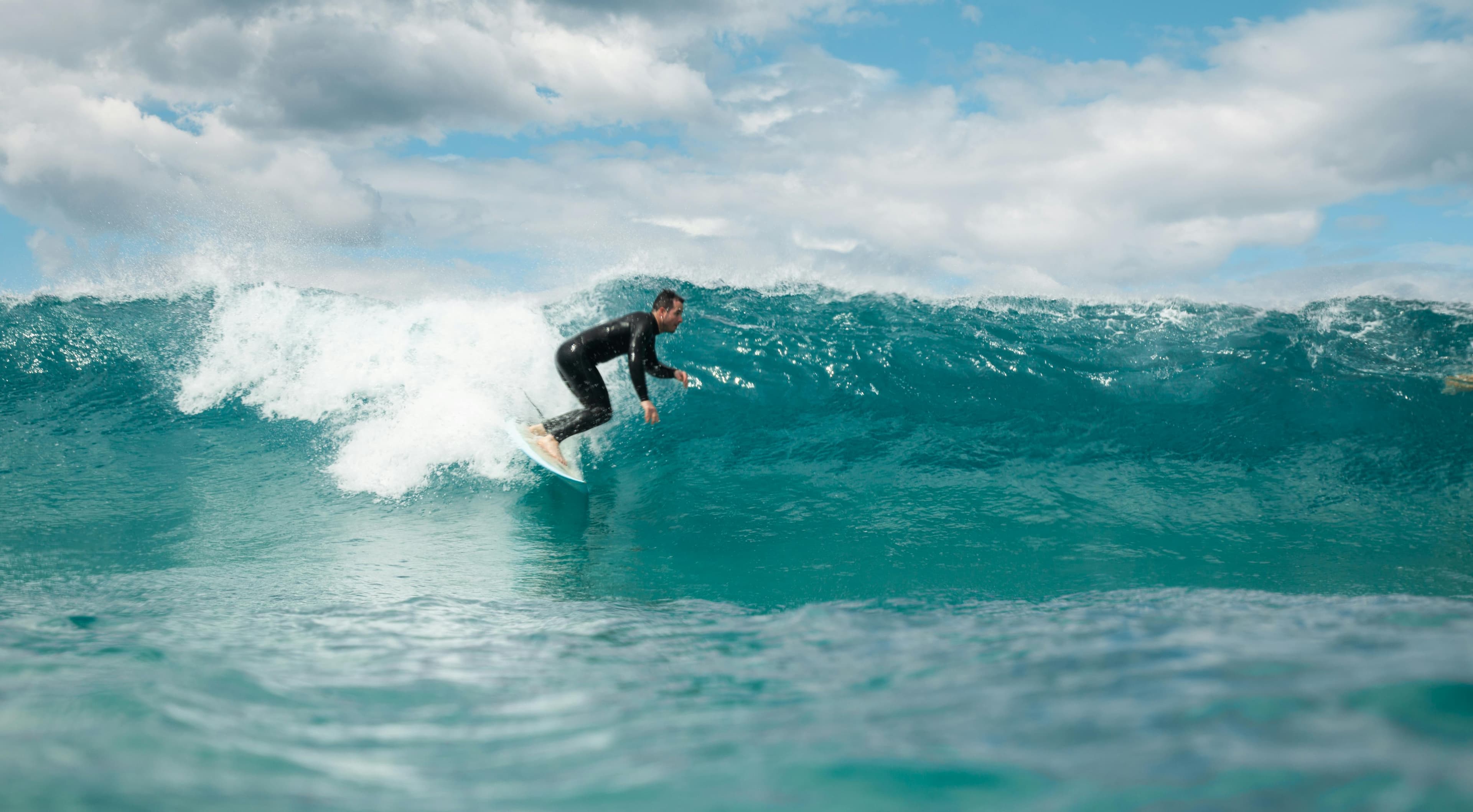Surfers at Punta Elena beach break, Corralejo